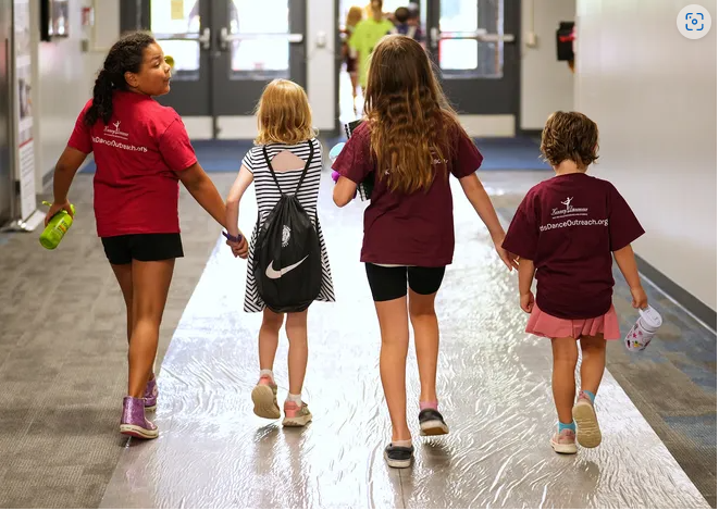  Students walking in a school hallway